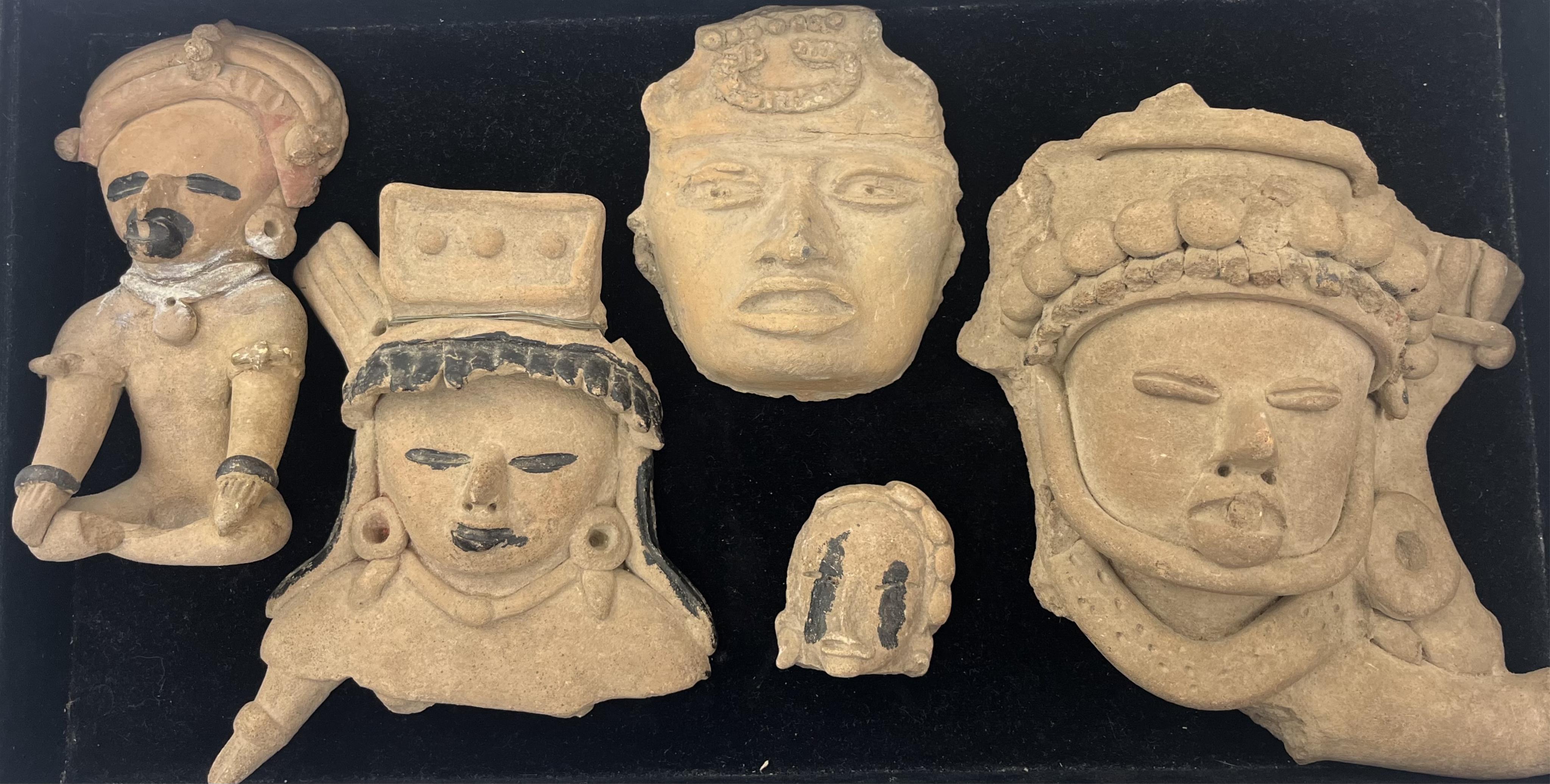 A group of four Pre-Columbian Veracruz pottery figures or fragments, Mexico, Classical period, 400-600 AD, and an Aztec pottery head